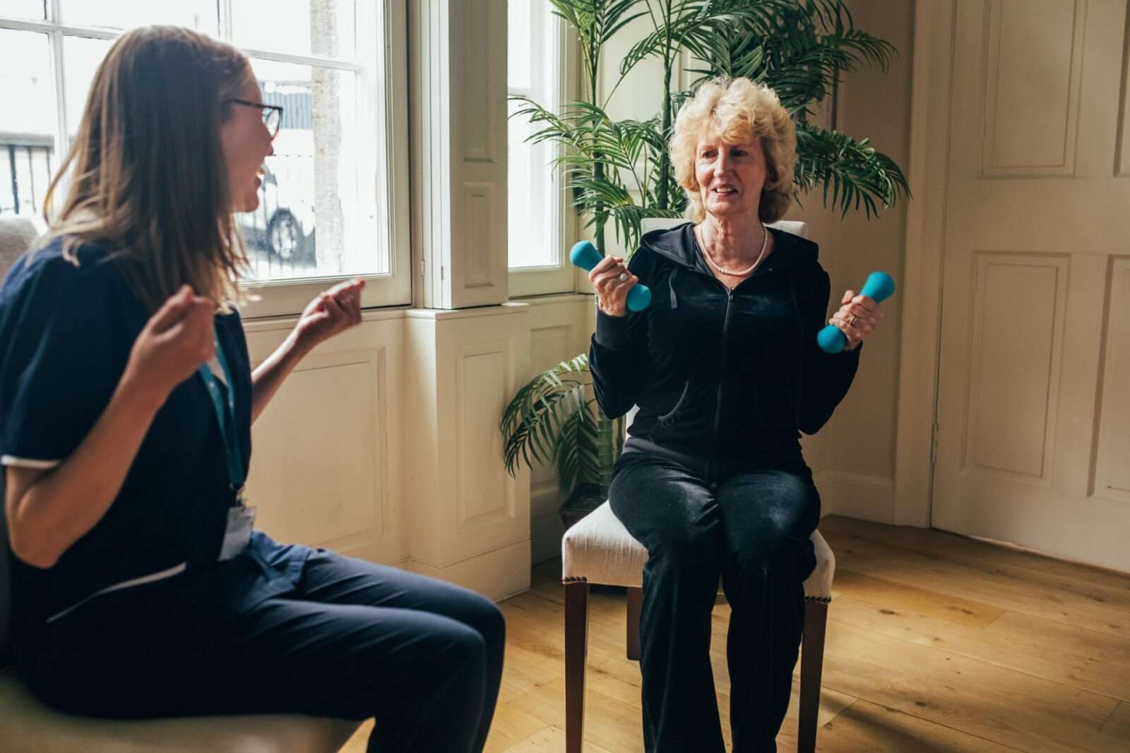 Hourly care, Bright Carer helping her client to exercise