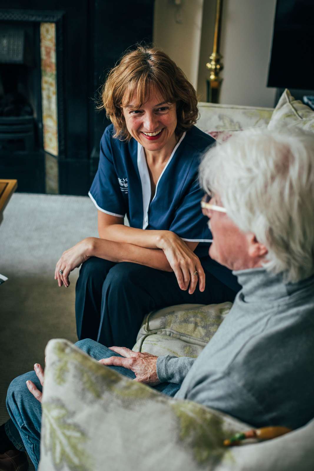 Care Assistant talking to client