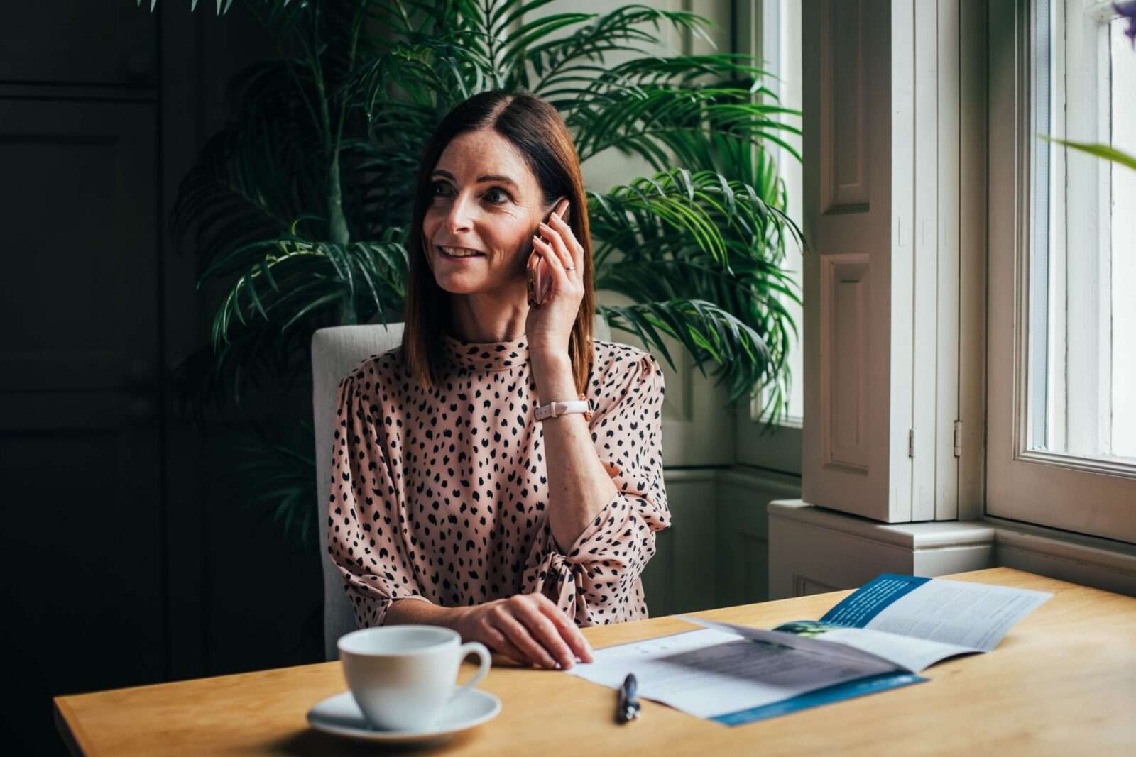 Elderly person's daughter phoning Bright Care for information