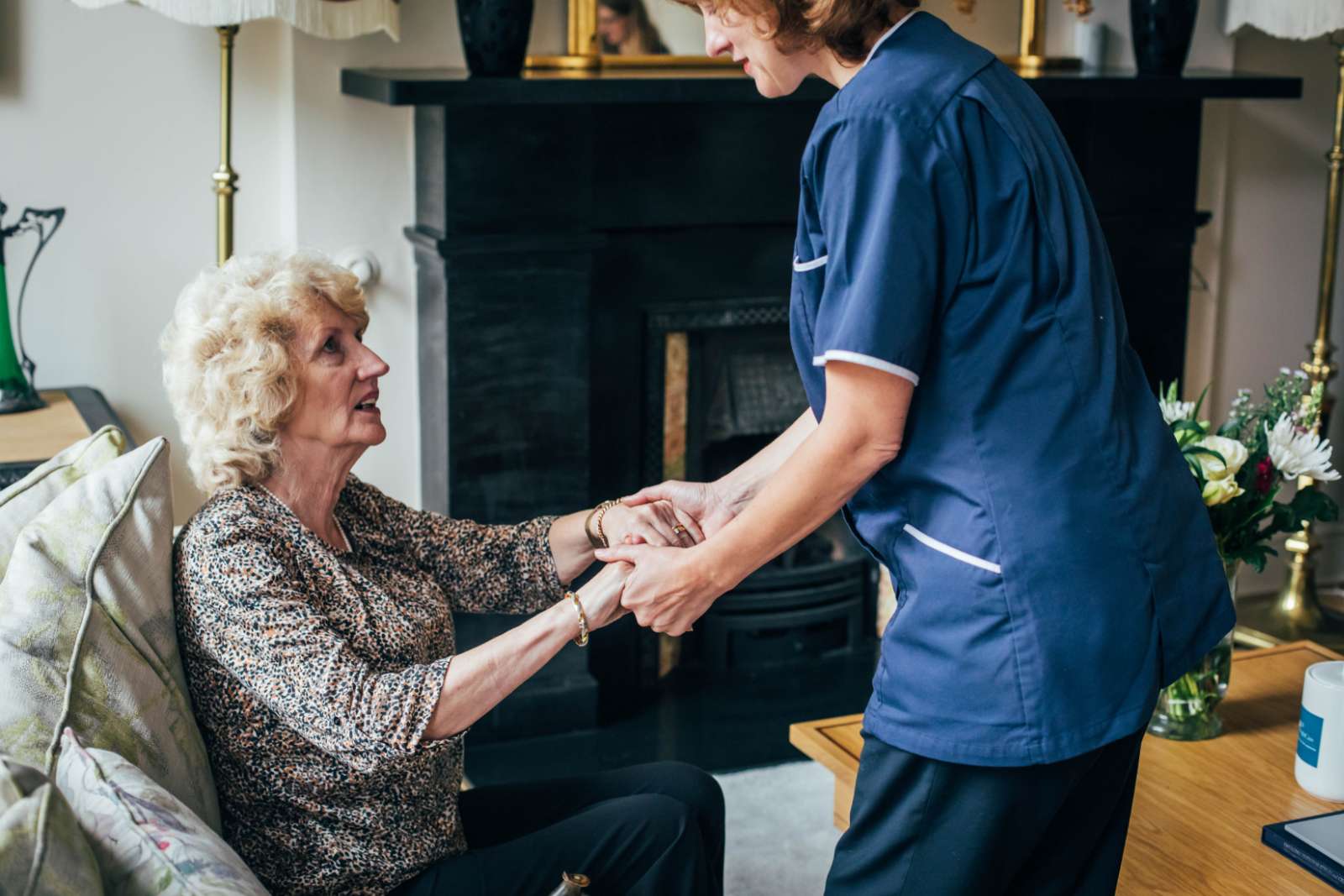 Carer helping client